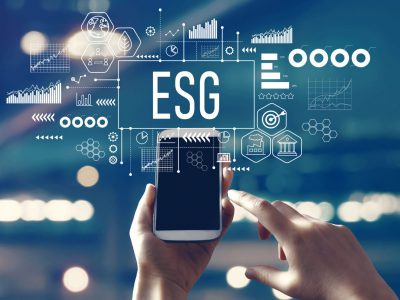 ESG - Environmental, Social and Governance concept with person using a smartphone